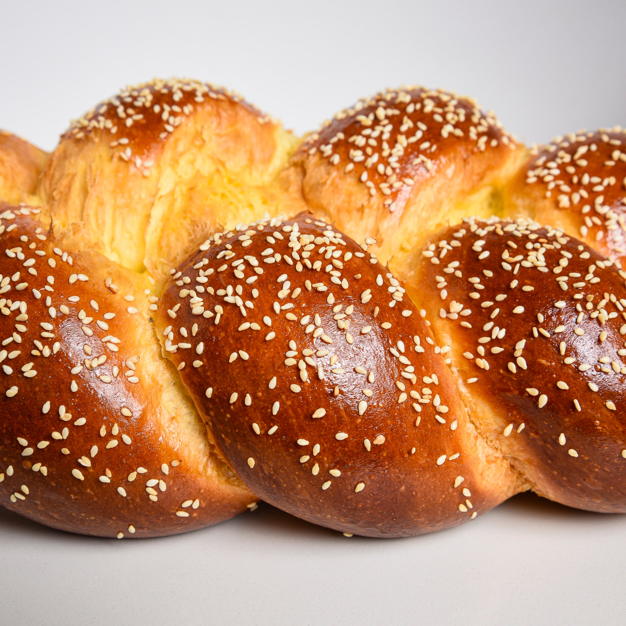 Close up of Le fournil challah with sesame seeds