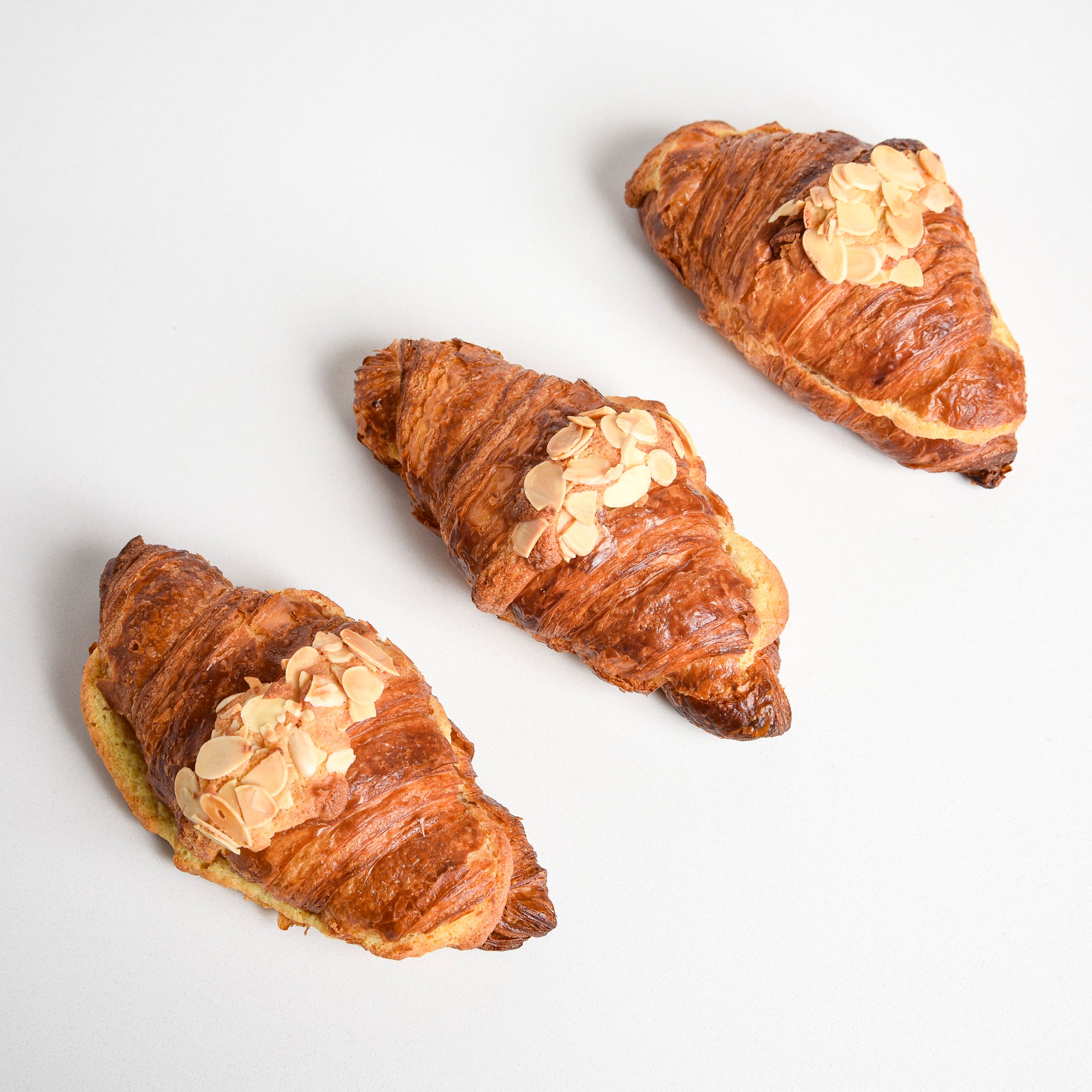Group of Le fournil bakery croissant aux amandes almonds