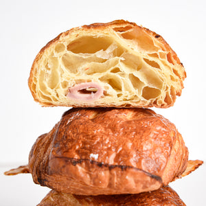 Cross section of Le fournil bakery pain au jambon fromage croissant with ham and Emmental cheese