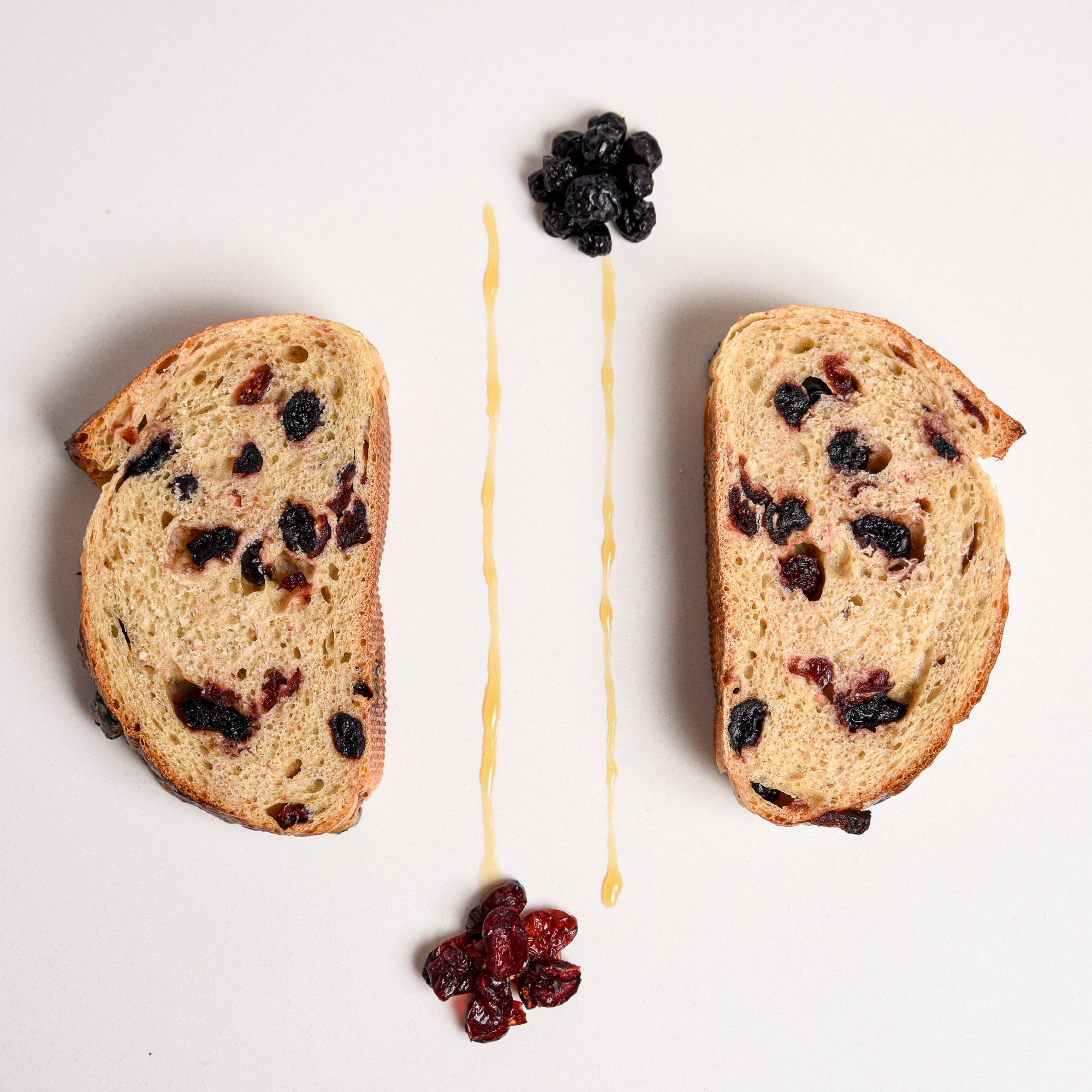 Le fournil Bakery Cranberry-blueberry bread stylized photo.