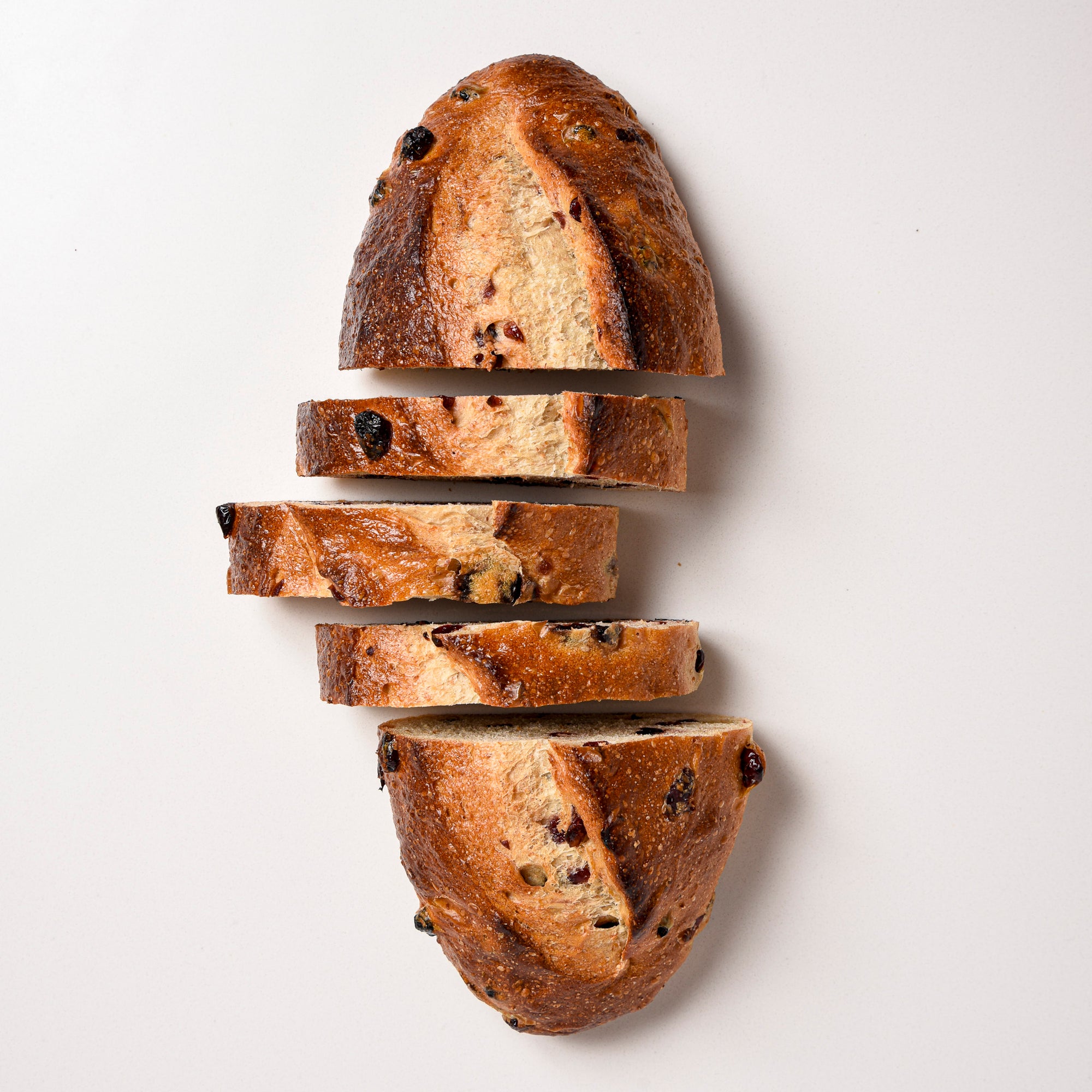 Le fournil Bakery Cranberry-blueberry bread sliced.