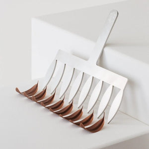 Chocolate Leaves Next to Comb by Frank Haasnoot