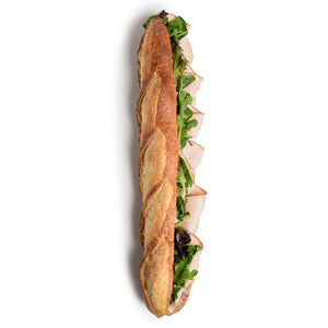 Le fournil bakery sandwich dinde canneberges smoked turkey with cranberry mayonnaise and lettuce